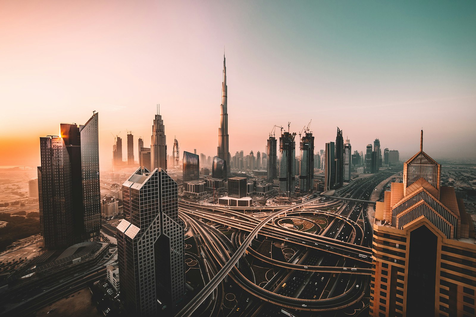 Illustrative photo: the Dubai skyline and Burj Khalifa at sunrise